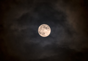 Naklejka na ściany i meble Super moon Blue moon against cloudy sky