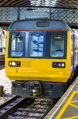 Obraz premium Class 142 Pacer Train. Outdated British train built with an adapted bus body on a freight chassis. This gives a uncomfortable ride. Built in the late 1980’s and still in use on busy commuter lines. 