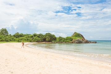 Balapitiya, Sri Lanka - A woman in a bay at the beach of Balapitiya