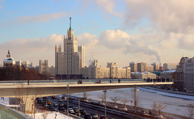01 February 2018, Moscow, Russia, View of the floating bridge with visitors attractions and the skyscraper on Kotelnicheskaya Embankment..