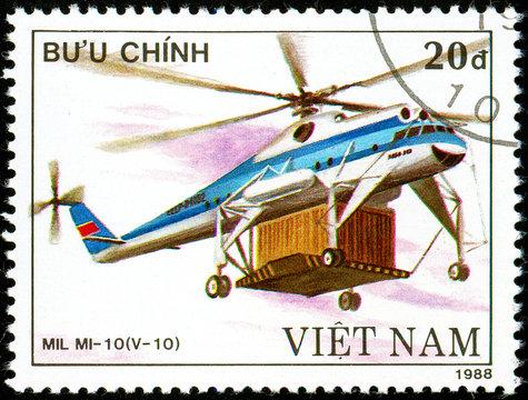 Ukraine - circa 2018: A postage stamp printed in Vietnam show Soviet helicopter Mil Mi -10. Circa 1988.