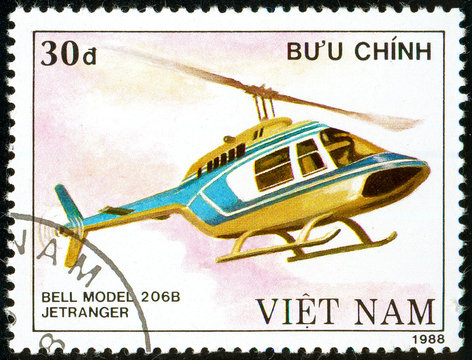 Ukraine - circa 2018: A postage stamp printed in Vietnam show multipurpose helicopter Bell Model 206B Jetranger. Circa 1988