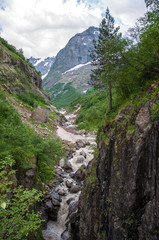 Fototapeta na wymiar Mountain river, a whirlpool. The Mountains Of Dombai.