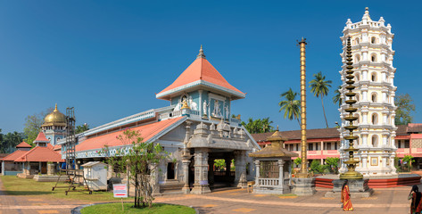 Panorama of Shri Mahalsa Indian Temple in Ponda, GOA, India. The opulent Mahalsa temple is one of the most famous temples in Goa.  - obrazy, fototapety, plakaty
