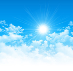 Naklejka na ściany i meble Blue sky, bright sun and white clouds