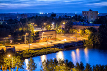 Fototapeta na wymiar Night view of the dam and city