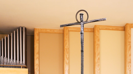 simply modern cross with Jesus Christ inside the church © Bartosz