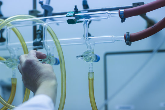Chemist adjusting burette