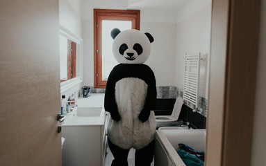 Men with animal costumes spending time inside the house © oneinchpunch
