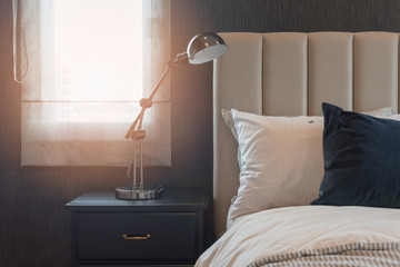 classic bedroom style with modern lamp