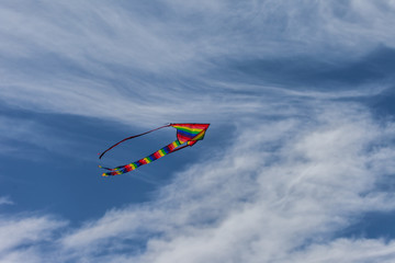 Kite on a cloudy sky