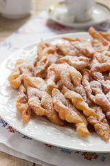 Angel wings biscuits, a traditional European sweet dish for carnival. Rustic style.