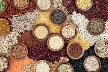  Dried health food background with smart carbs of pulses, grains, seeds and cereals. Super foods high in vitamins, antioxidants, omega 3, anthocyanins, minerals and fibre. Top view. © marilyn barbone