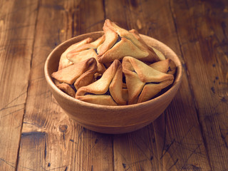 Hamantaschen cookies on wooden table