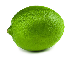 single ripe lime isolated on white background