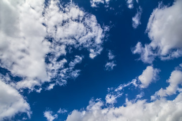 Bright blue sky and white clouds in clear weather appropriate for background