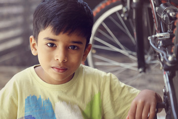     Indian Little Boy with Cycle 