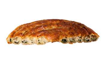 Half of the traditional turkish spinach pie isolated on white. ispanak yufka with goat cheese