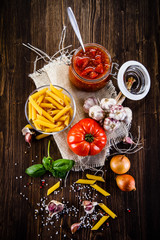 Spaghetti sauce on wooden background