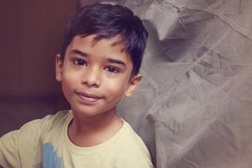 Portrait of Indian Little Boy Posing to Camera