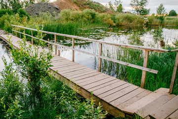 the wooden bridge across the river