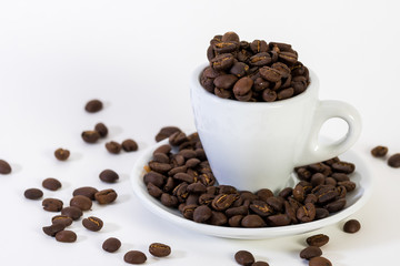 Coffee or espresso cup with coffee beans plain white background