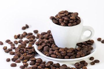 Coffee or espresso cup with coffee beans plain white background