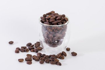 Coffee or espresso cup with coffee beans plain white background