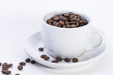 Coffee or espresso cup with coffee beans plain white background