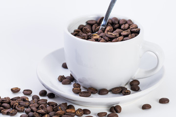 Coffee or espresso cup with coffee beans plain white background