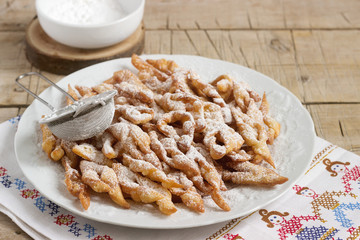 Angel wings biscuits, a traditional European sweet dish for carnival. Rustic style.