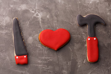 cookies in the shape of a heart. cookies hammer. Gingerbread as a tool hammer