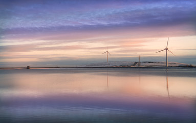 Fototapeta na wymiar Windmill turbine sunset
