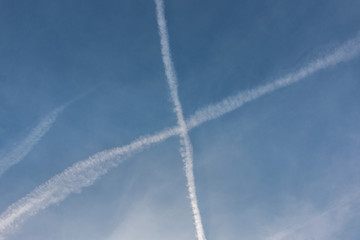 Contrails in the blue sky