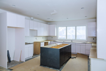 Installing new induction kitchen kitchen Installation of kitchen cabinet.