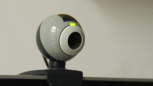 Green light switches on as webcam starts to record.
