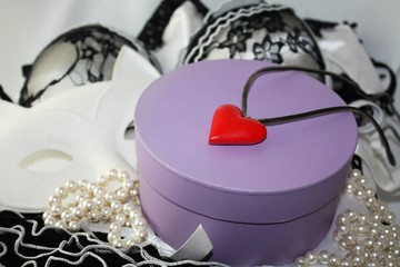Violet circle round box and plastic red heart necklace pendant, valentines day present, love gift concept