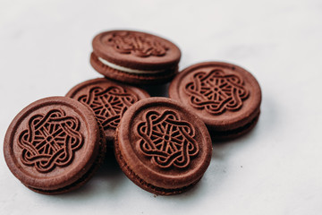 Sandwich cocoa cookie with crema inside