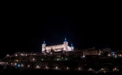 Fototapeta na wymiar Alcazar of Toledo. Night view. The Historic City of Toledo was declared a World Heritage Site by UNESCO in 1986