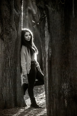 Beautiful Mysterious Woman Posing in The Forest, Monochrome Old Classic Style photograph
