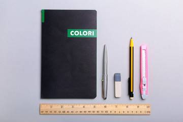 office supplies and gadgets on desk. Top View.