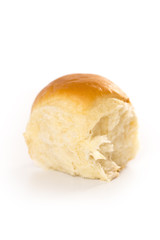 Generica Store Bought Resturant Batch Baked White Dinner Roll on a White Background