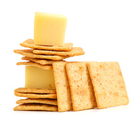 Delicious crackers with cheese on white background