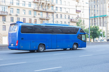 tourist bus goes on street