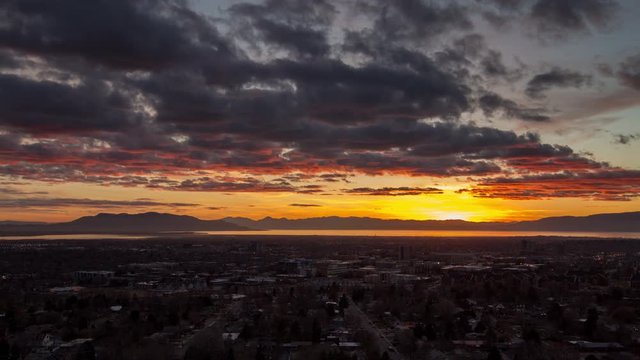 Sunset time lapse over Provo displaying magnificent colors reflecting on clouds