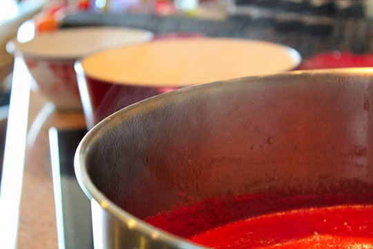 Water vapor rising from a tomato sauce