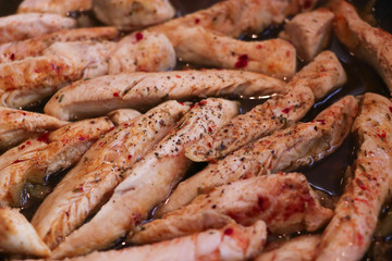 appetizing chicken strips freshly prepared and well spiced
