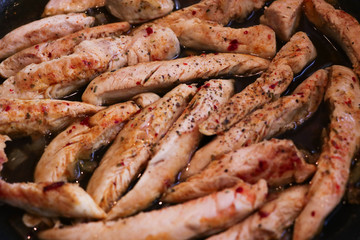 appetizing chicken strips freshly prepared and well spiced