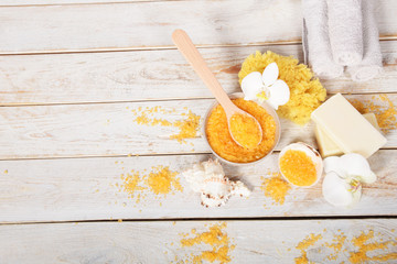fruit bath salt with olive oil and gray natural soap next to the orchidwith place for text