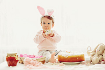 little girl eating cake for Easter